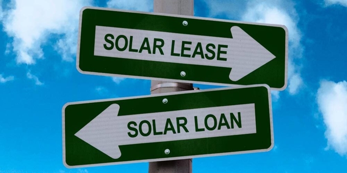 signs reading solar lease and solar loan